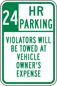 24 Hour Parking Violators Will Be Towed Sign