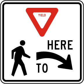 Yield Here to Pedestrians Sign