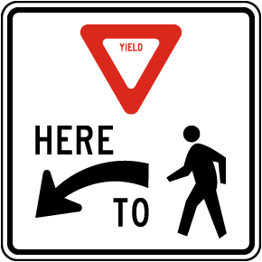 Yield Here to Pedestrians Sign