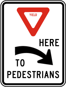 Yield Here to Pedestrians Sign